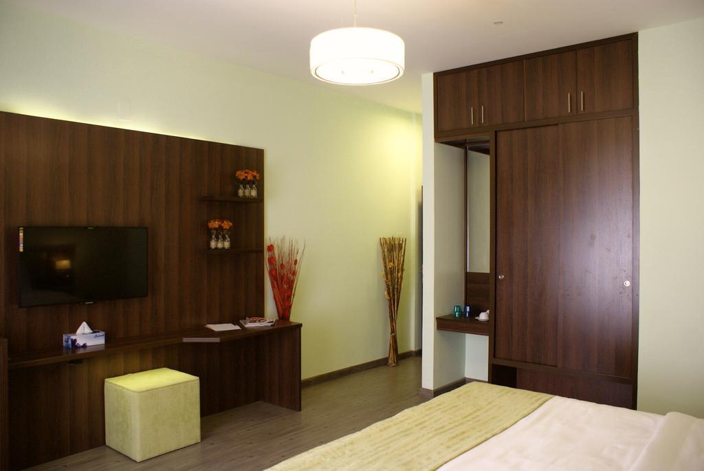 Weekend Hotel & Apartments Mascate Chambre photo