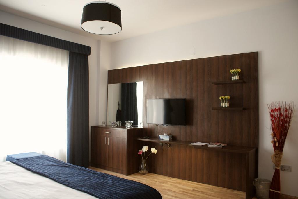 Weekend Hotel & Apartments Mascate Chambre photo