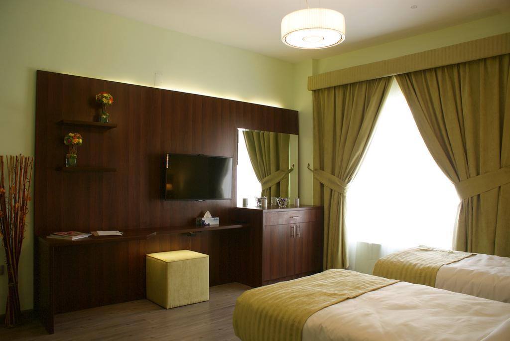 Weekend Hotel & Apartments Mascate Chambre photo